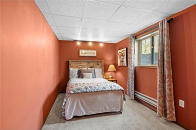 Experience the best of cabin comfort and modern design in this on Voyager Village Country Club - Voyager in Wisconsin - for sale on GolfHomes.com, golf home, golf lot