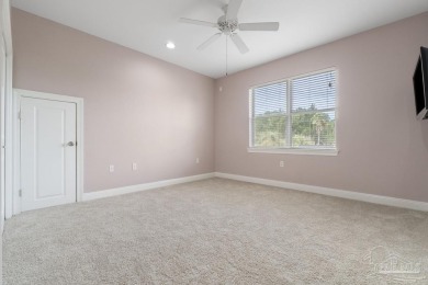Discover this beautiful 5-bedroom, 5-bath single-family home on Tiger Point Golf and Country Club in Florida - for sale on GolfHomes.com, golf home, golf lot