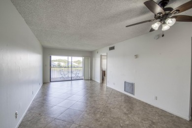 Opportunity awaits to finish making this home yours.  Neutral on Old Marsh Golf Club in Florida - for sale on GolfHomes.com, golf home, golf lot