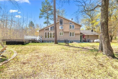 Experience the best of cabin comfort and modern design in this on Voyager Village Country Club - Voyager in Wisconsin - for sale on GolfHomes.com, golf home, golf lot