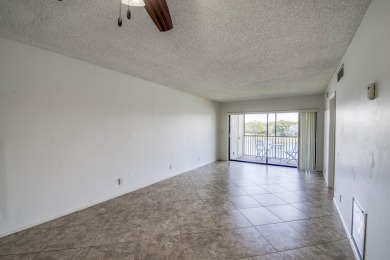 Opportunity awaits to finish making this home yours.  Neutral on Old Marsh Golf Club in Florida - for sale on GolfHomes.com, golf home, golf lot
