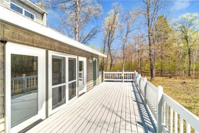 Experience the best of cabin comfort and modern design in this on Voyager Village Country Club - Voyager in Wisconsin - for sale on GolfHomes.com, golf home, golf lot
