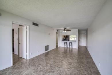 Opportunity awaits to finish making this home yours.  Neutral on Old Marsh Golf Club in Florida - for sale on GolfHomes.com, golf home, golf lot