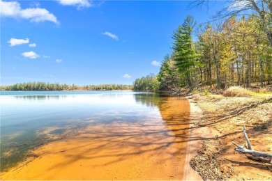 Experience the best of cabin comfort and modern design in this on Voyager Village Country Club - Voyager in Wisconsin - for sale on GolfHomes.com, golf home, golf lot