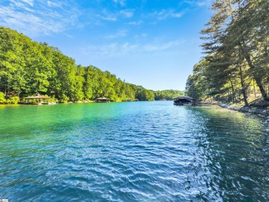 Nestled in a quiet cove,  with coveted southern exposure, this on The Reserve At Lake Keowee in South Carolina - for sale on GolfHomes.com, golf home, golf lot