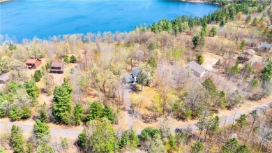 Experience the best of cabin comfort and modern design in this on Voyager Village Country Club - Voyager in Wisconsin - for sale on GolfHomes.com, golf home, golf lot