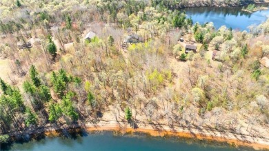 Experience the best of cabin comfort and modern design in this on Voyager Village Country Club - Voyager in Wisconsin - for sale on GolfHomes.com, golf home, golf lot