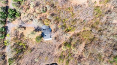 Experience the best of cabin comfort and modern design in this on Voyager Village Country Club - Voyager in Wisconsin - for sale on GolfHomes.com, golf home, golf lot