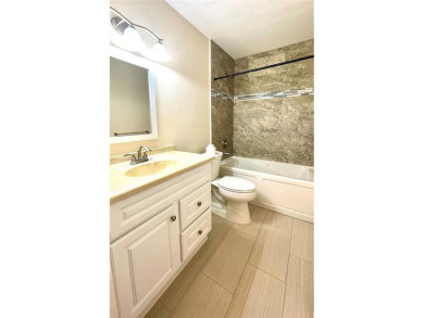 Discover this beautifully upgraded 2-bedroom, 2-bath corner unit on Pine Island Ridge Country Club in Florida - for sale on GolfHomes.com, golf home, golf lot