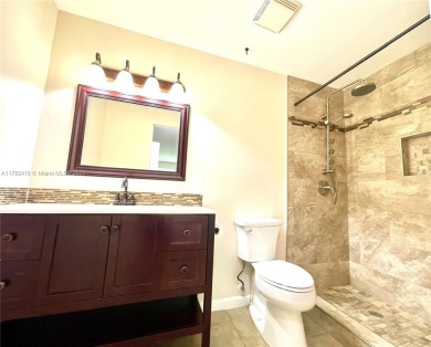 Discover this beautifully upgraded 2-bedroom, 2-bath corner unit on Pine Island Ridge Country Club in Florida - for sale on GolfHomes.com, golf home, golf lot