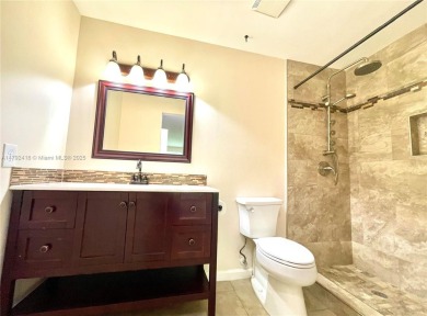 Discover this beautifully upgraded 2-bedroom, 2-bath corner unit on Pine Island Ridge Country Club in Florida - for sale on GolfHomes.com, golf home, golf lot
