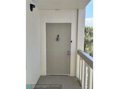 BRIGHT & SPACIOUS CORNER OVERLOOKING THE POOL AREA & SURROUNDING on Wynmoor Golf Course in Florida - for sale on GolfHomes.com, golf home, golf lot
