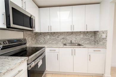 Completely remodeled 1st-floor corner unit in the 55+ Kings on Kings Point Golf -Flanders Way in Florida - for sale on GolfHomes.com, golf home, golf lot