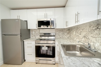 Completely remodeled 1st-floor corner unit in the 55+ Kings on Kings Point Golf -Flanders Way in Florida - for sale on GolfHomes.com, golf home, golf lot