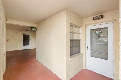 This First level condo will allow you to walk out to the on Largo Golf Course in Florida - for sale on GolfHomes.com, golf home, golf lot