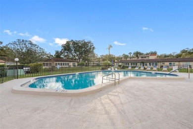 This First level condo will allow you to walk out to the on Largo Golf Course in Florida - for sale on GolfHomes.com, golf home, golf lot