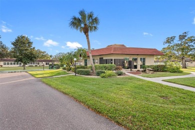 This First level condo will allow you to walk out to the on Largo Golf Course in Florida - for sale on GolfHomes.com, golf home, golf lot