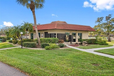 This First level condo will allow you to walk out to the on Largo Golf Course in Florida - for sale on GolfHomes.com, golf home, golf lot