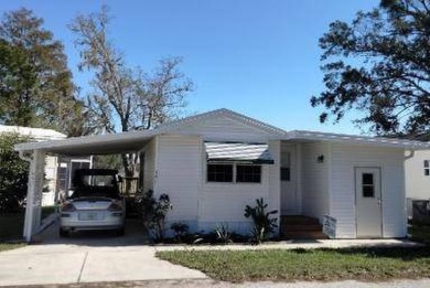 BREATHTAKING VIEWS AND A TURNKEY HOME. JUST PACK YOUR BAGS AND on Clerbrook Resort, Inc. in Florida - for sale on GolfHomes.com, golf home, golf lot