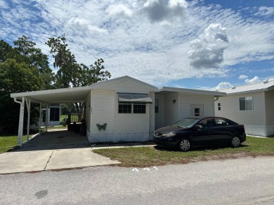 BREATHTAKING VIEWS AND A TURNKEY HOME. JUST PACK YOUR BAGS AND on Clerbrook Resort, Inc. in Florida - for sale on GolfHomes.com, golf home, golf lot