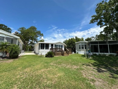 BREATHTAKING VIEWS AND A TURNKEY HOME. JUST PACK YOUR BAGS AND on Clerbrook Resort, Inc. in Florida - for sale on GolfHomes.com, golf home, golf lot