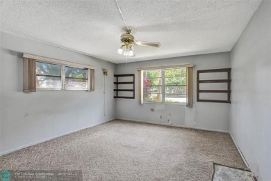 One word describes this first floor, two bedroom/two bathroom on Wynmoor Golf Course in Florida - for sale on GolfHomes.com, golf home, golf lot