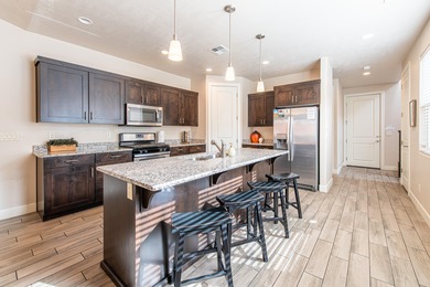 This stunning home is located in the highly sought-after on Entrada at Snow Canyon in Utah - for sale on GolfHomes.com, golf home, golf lot