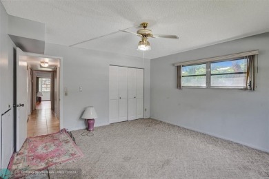 One word describes this first floor, two bedroom/two bathroom on Wynmoor Golf Course in Florida - for sale on GolfHomes.com, golf home, golf lot