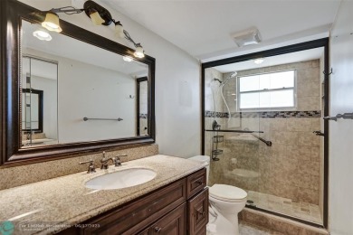 One word describes this first floor, two bedroom/two bathroom on Wynmoor Golf Course in Florida - for sale on GolfHomes.com, golf home, golf lot