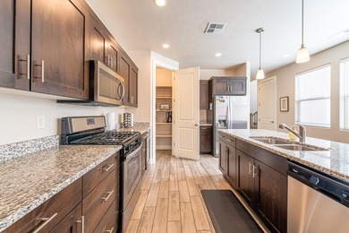 This stunning home is located in the highly sought-after on Entrada at Snow Canyon in Utah - for sale on GolfHomes.com, golf home, golf lot