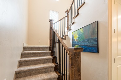 This stunning home is located in the highly sought-after on Entrada at Snow Canyon in Utah - for sale on GolfHomes.com, golf home, golf lot