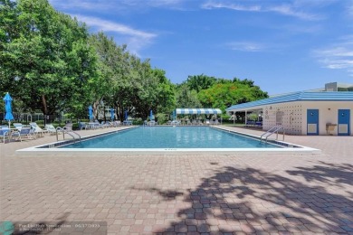 One word describes this first floor, two bedroom/two bathroom on Wynmoor Golf Course in Florida - for sale on GolfHomes.com, golf home, golf lot