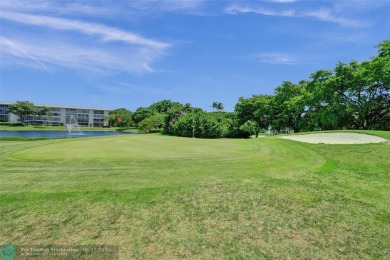 One word describes this first floor, two bedroom/two bathroom on Wynmoor Golf Course in Florida - for sale on GolfHomes.com, golf home, golf lot