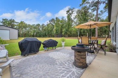 Discover this stunning, one-of-a-kind home built by Pafford on Wildwood Country Club in Florida - for sale on GolfHomes.com, golf home, golf lot