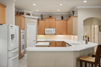 Welcome to this exceptionally well-maintained pool home on The Legends Golf and Country Club in Florida - for sale on GolfHomes.com, golf home, golf lot