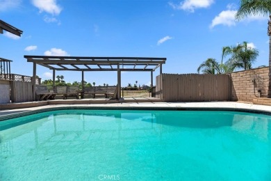 Pool Home with Two Primary Bedrooms, Golf Course & City Light on Cresta Verde Golf Club in California - for sale on GolfHomes.com, golf home, golf lot