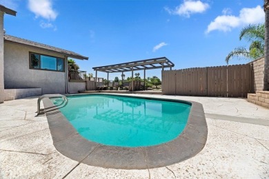 Pool Home with Two Primary Bedrooms, Golf Course & City Light on Cresta Verde Golf Club in California - for sale on GolfHomes.com, golf home, golf lot