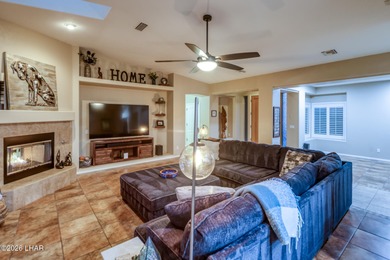 Welcome to this beautifully appointed retreat on a 1/3 acre lot on London Bridge Golf Course in Arizona - for sale on GolfHomes.com, golf home, golf lot