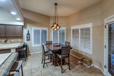 Welcome to this beautifully appointed retreat on a 1/3 acre lot on London Bridge Golf Course in Arizona - for sale on GolfHomes.com, golf home, golf lot