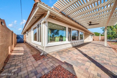 This exceptional custom Sun City home is ideally positioned on Sun City South Golf Course in Arizona - for sale on GolfHomes.com, golf home, golf lot