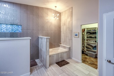 Welcome to this beautifully appointed retreat on a 1/3 acre lot on London Bridge Golf Course in Arizona - for sale on GolfHomes.com, golf home, golf lot