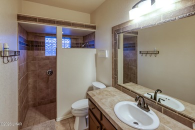 Welcome to this beautifully appointed retreat on a 1/3 acre lot on London Bridge Golf Course in Arizona - for sale on GolfHomes.com, golf home, golf lot