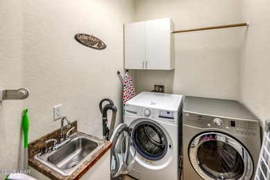 Welcome to this beautifully appointed retreat on a 1/3 acre lot on London Bridge Golf Course in Arizona - for sale on GolfHomes.com, golf home, golf lot