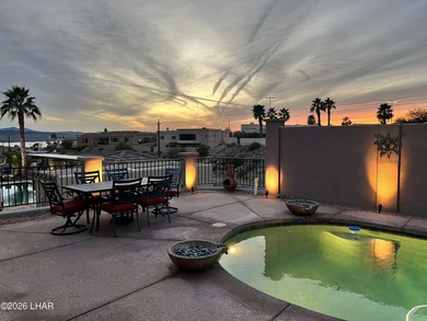 Welcome to this beautifully appointed retreat on a 1/3 acre lot on London Bridge Golf Course in Arizona - for sale on GolfHomes.com, golf home, golf lot