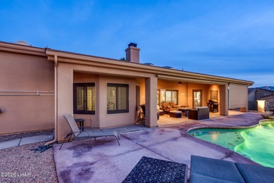 Welcome to this beautifully appointed retreat on a 1/3 acre lot on London Bridge Golf Course in Arizona - for sale on GolfHomes.com, golf home, golf lot