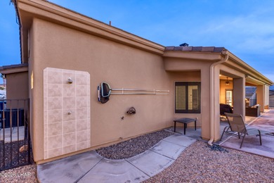 Welcome to this beautifully appointed retreat on a 1/3 acre lot on London Bridge Golf Course in Arizona - for sale on GolfHomes.com, golf home, golf lot