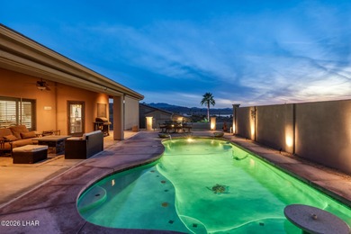 Welcome to this beautifully appointed retreat on a 1/3 acre lot on London Bridge Golf Course in Arizona - for sale on GolfHomes.com, golf home, golf lot