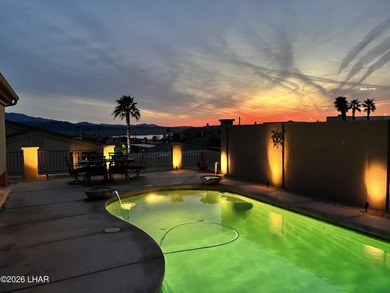 Welcome to this beautifully appointed retreat on a 1/3 acre lot on London Bridge Golf Course in Arizona - for sale on GolfHomes.com, golf home, golf lot