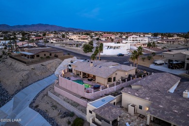 Welcome to this beautifully appointed retreat on a 1/3 acre lot on London Bridge Golf Course in Arizona - for sale on GolfHomes.com, golf home, golf lot