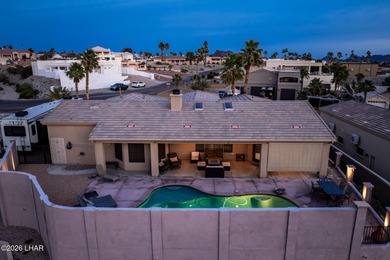 Welcome to this beautifully appointed retreat on a 1/3 acre lot on London Bridge Golf Course in Arizona - for sale on GolfHomes.com, golf home, golf lot